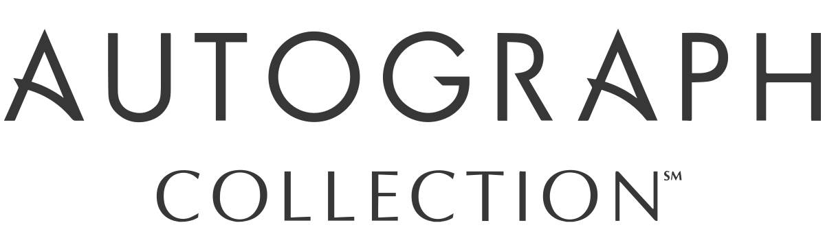 A stylized &ldquo;AUTOGRAPH COLLECTION&rdquo; logo in dark letters on a light background, with &ldquo;AUTOGRAPH&rdquo; on top and &ldquo;COLLECTION&rdquo; underneath, centered.